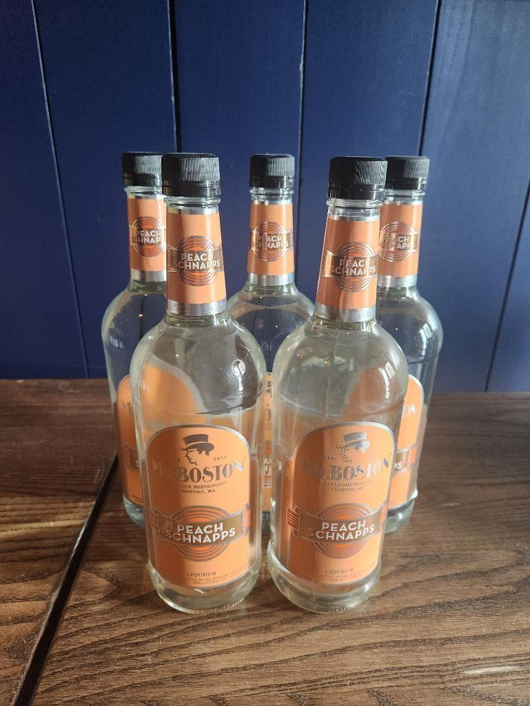 8 Bottles of Mr. Boston Peach Schnapps 1L, Sold 8x$, by the Bottle