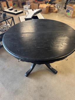 Used Large Black Round Retail Display Table