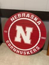 Round Nebraska Cornhuskers Sign