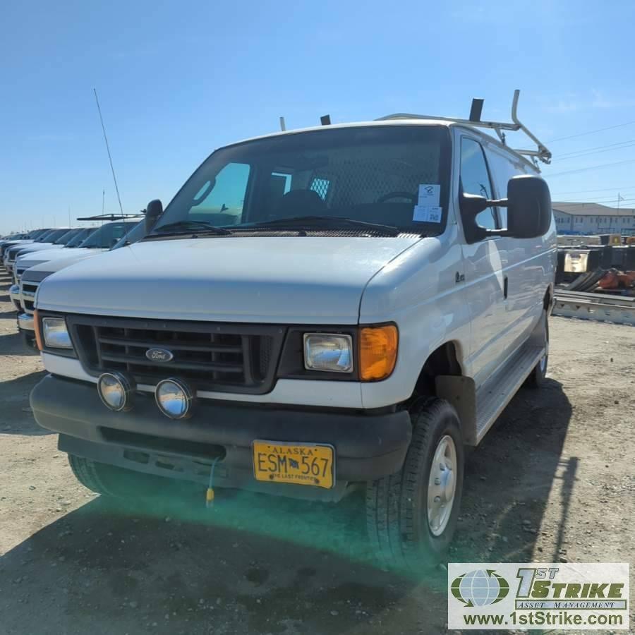 2005 FORD E-250, 5.4L GAS ENGINE, QUIGLEY 4X4, CARGO CONFIGURATION WITH TOOL CAGE, SHELVING