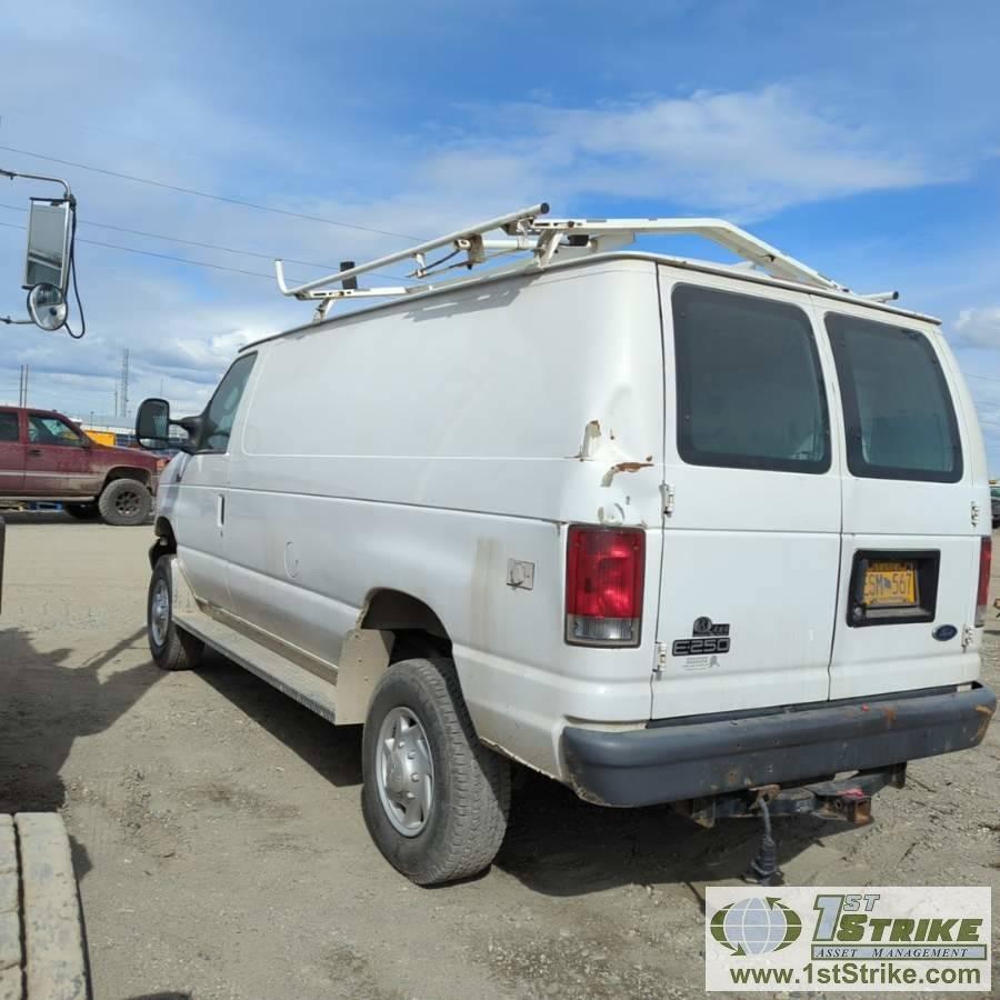 2005 FORD E-250, 5.4L GAS ENGINE, QUIGLEY 4X4, CARGO CONFIGURATION WITH TOOL CAGE, SHELVING