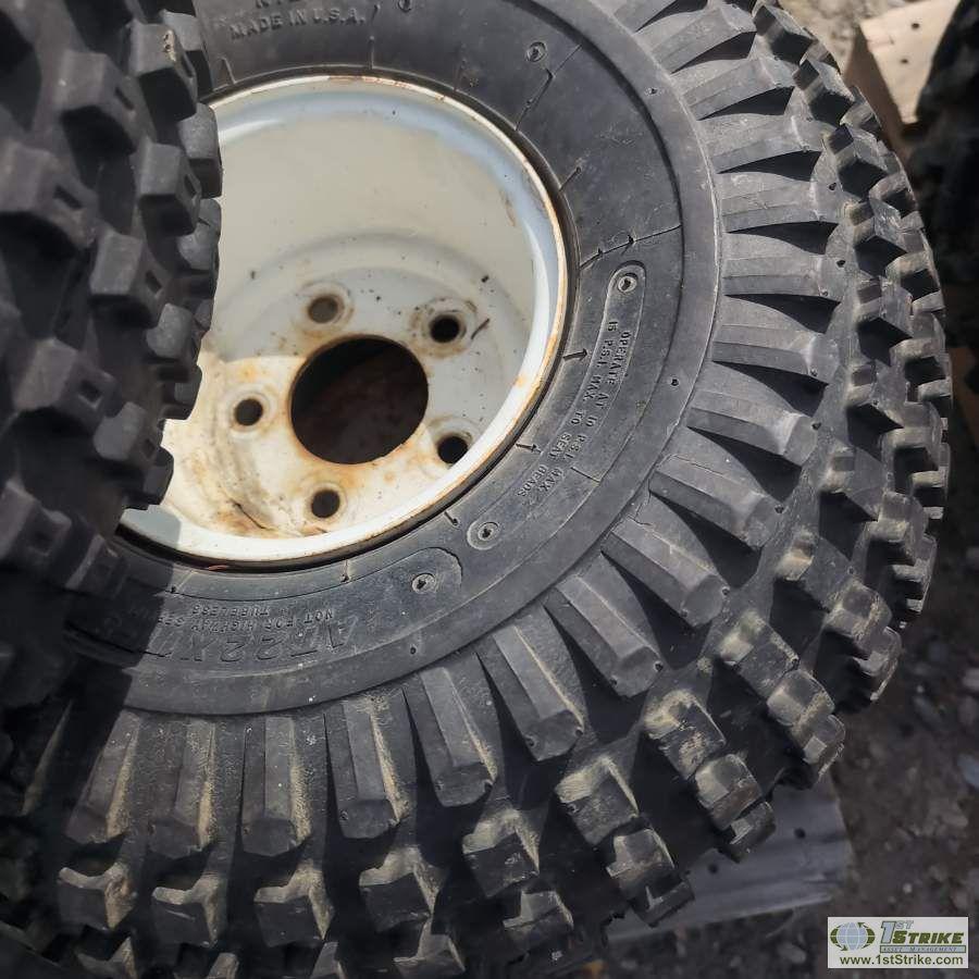 1 PALLET. 9EA MISC ATV TIRES, INCL: 4EA CARLISLE ON RIMS, 4EA DUNLOP, 1EA HENTSHIM