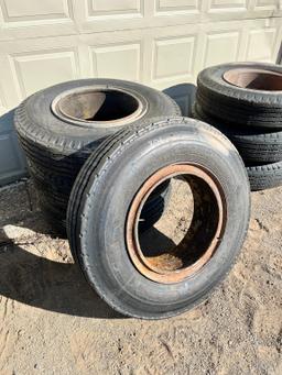 (4) USED 10.00-20 TIRES, MOUNTED TIRES, NEW & USED