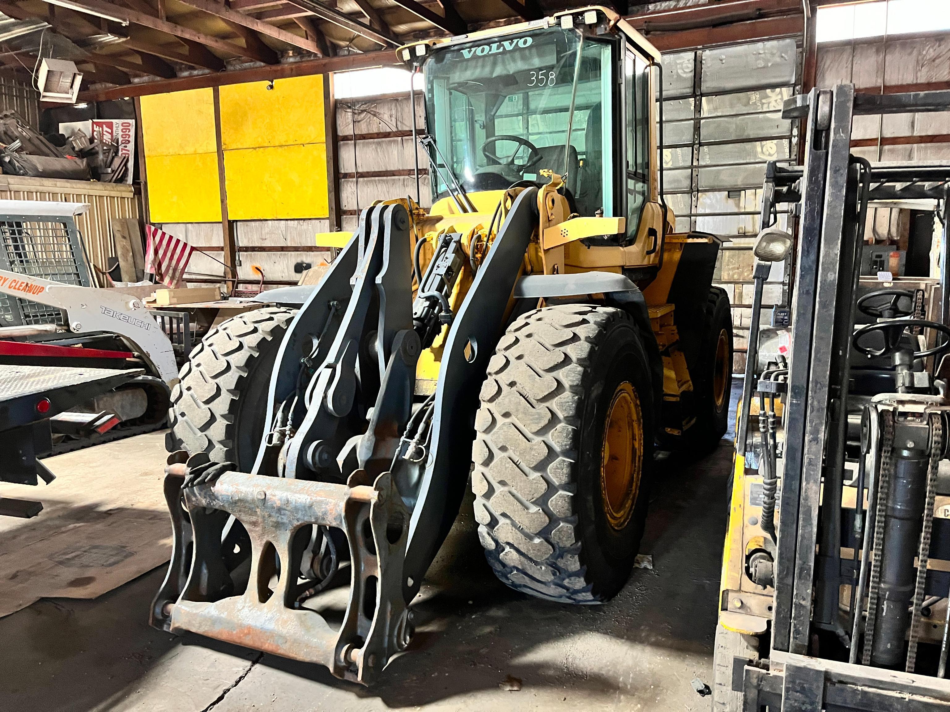 VOLVO L60F RUBBER TIRED LOADER powered by Volvo diesel engine, equipped with EROPS, air, ride