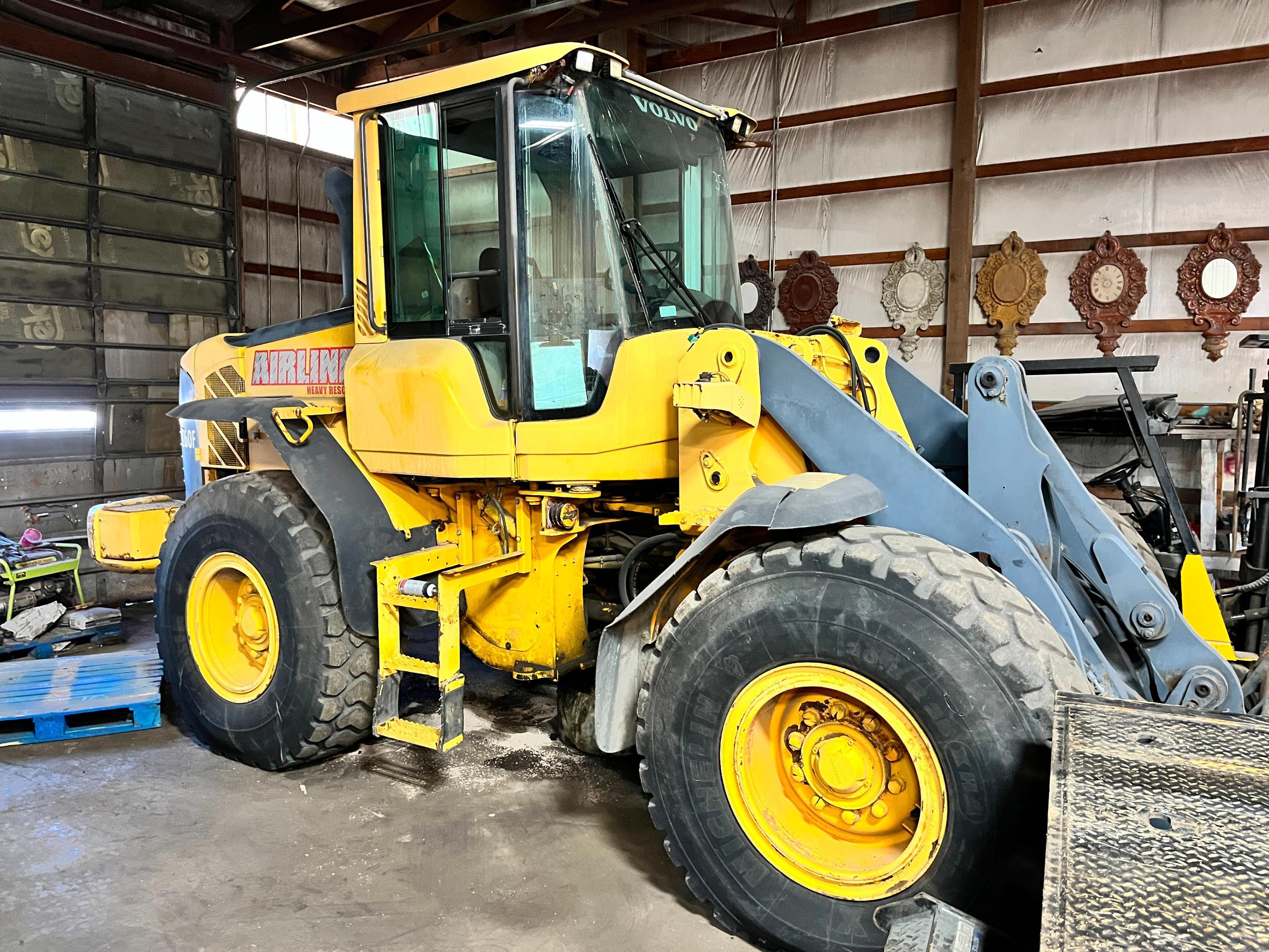 VOLVO L60F RUBBER TIRED LOADER powered by Volvo diesel engine, equipped with EROPS, air, ride