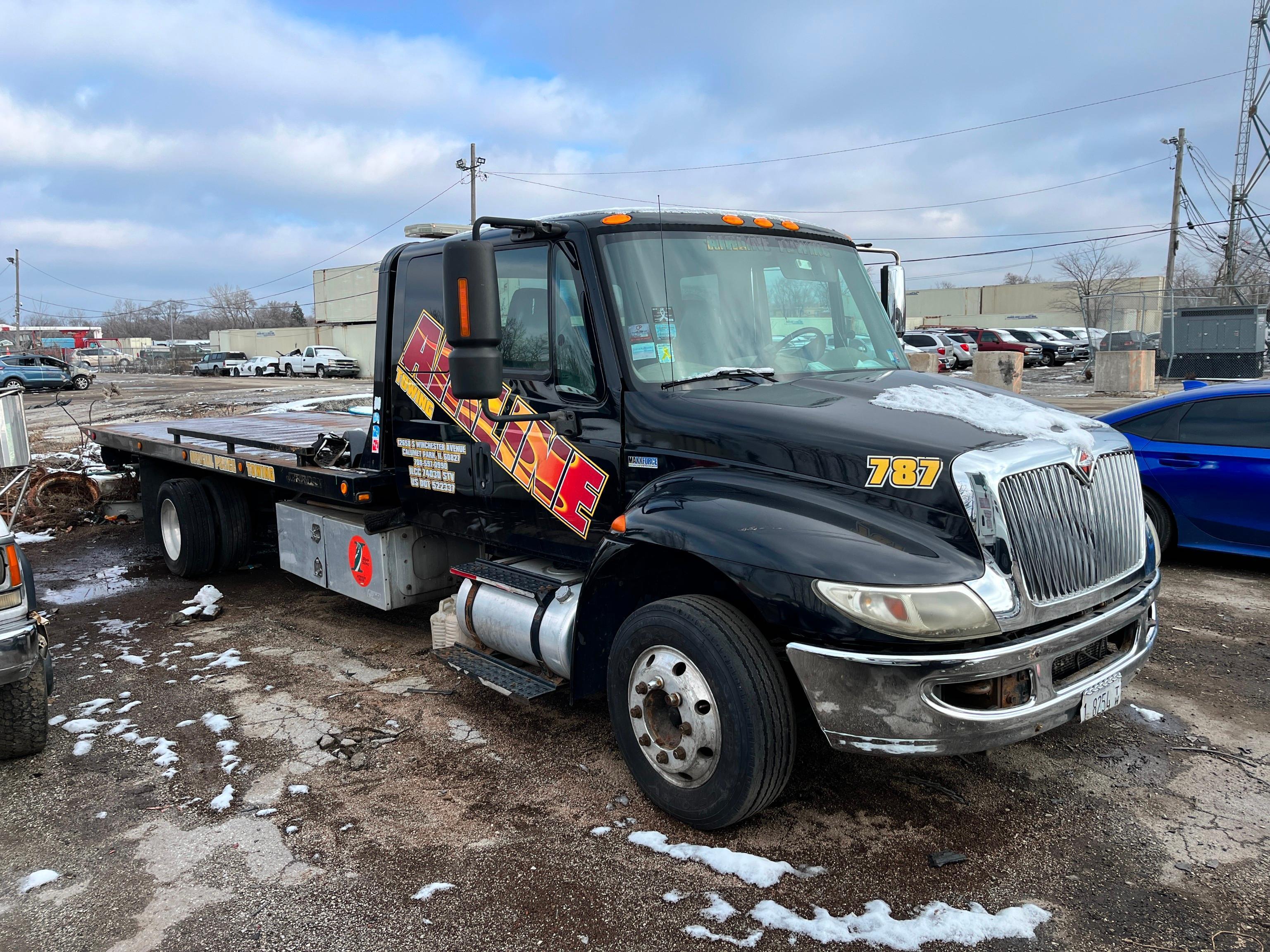 2012 INTERNATIONAL 4300 M7 ROLLBACK TRUCK VN:3HAJTSKM6CL673305 powered by MaxxForce diesel engine,