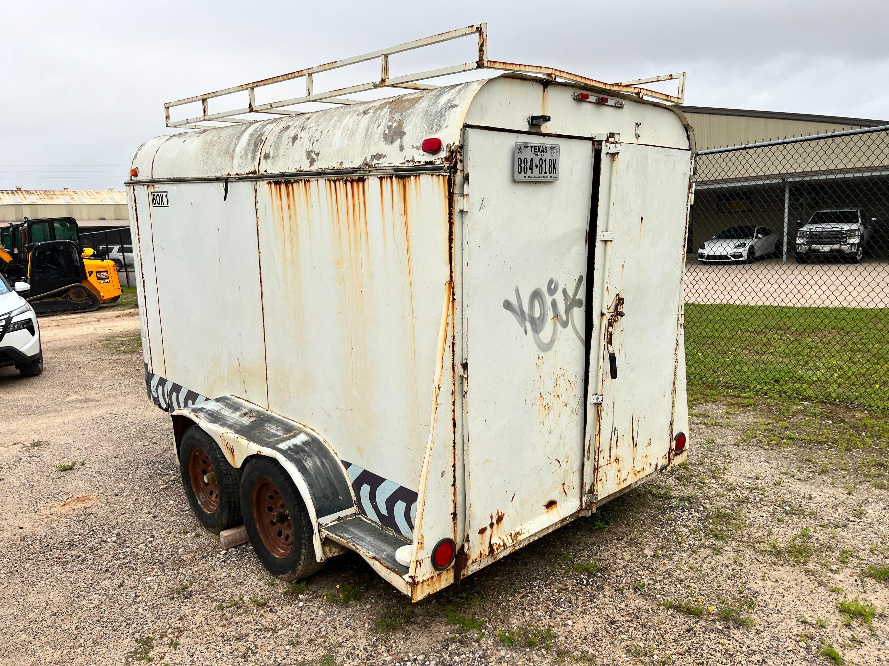 2003 CARGO TRAILER VN:5EMCS12203T000531...equipped with 12ft. Enclosed body, swing rear doors,