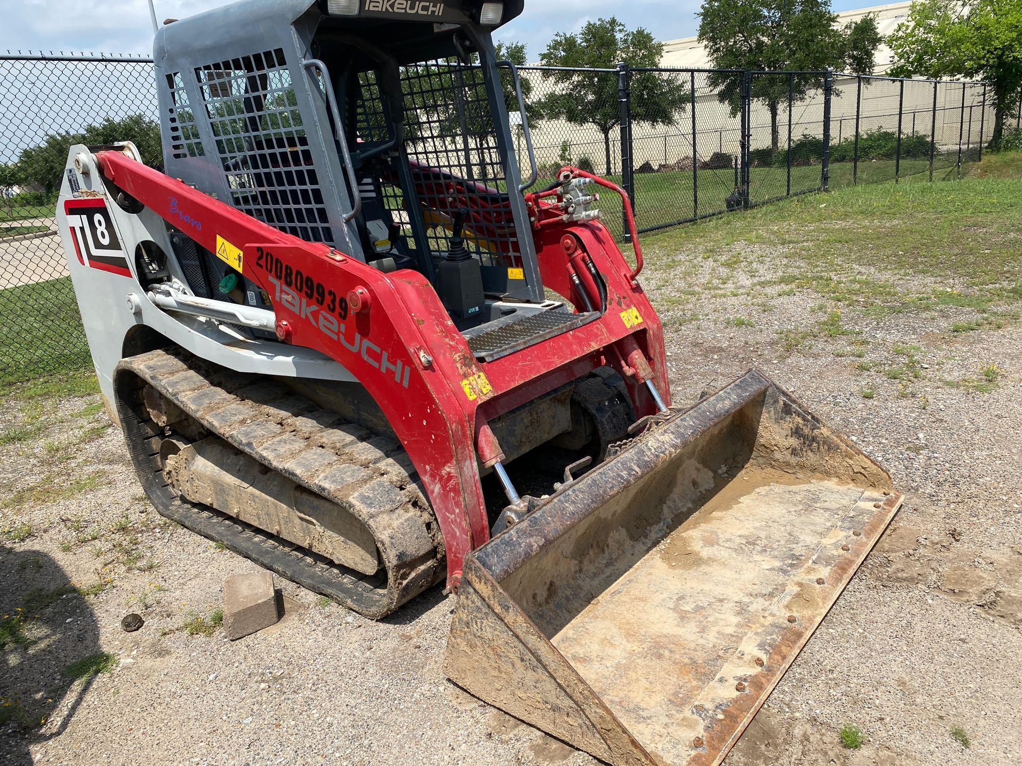 TAKEUCHI TL8 RUBBER TRACKED SKID STEER SN:9939 powered by diesel engine, equipped with rollcage,