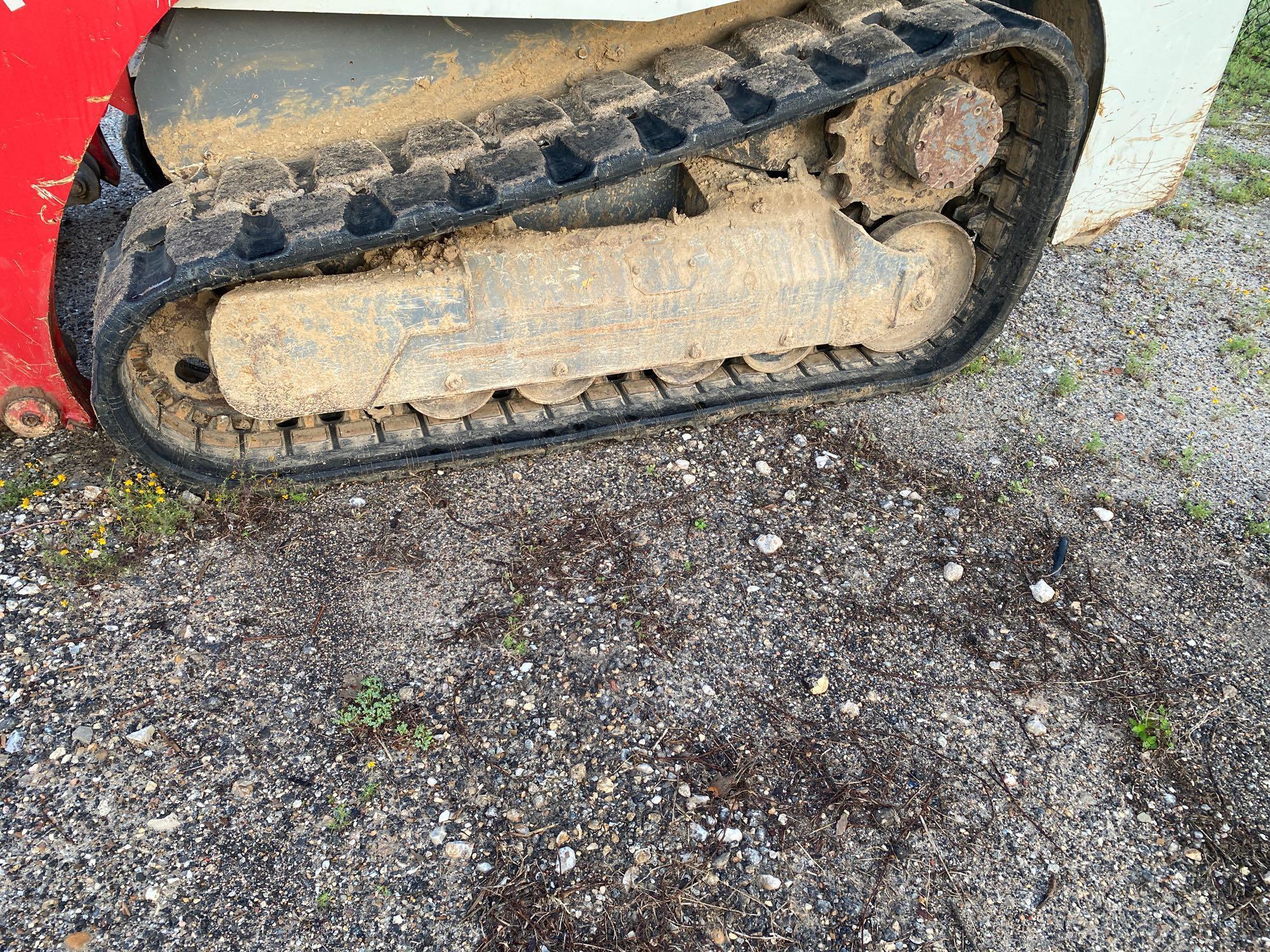 TAKEUCHI TL8 RUBBER TRACKED SKID STEER SN:9939 powered by diesel engine, equipped with rollcage,