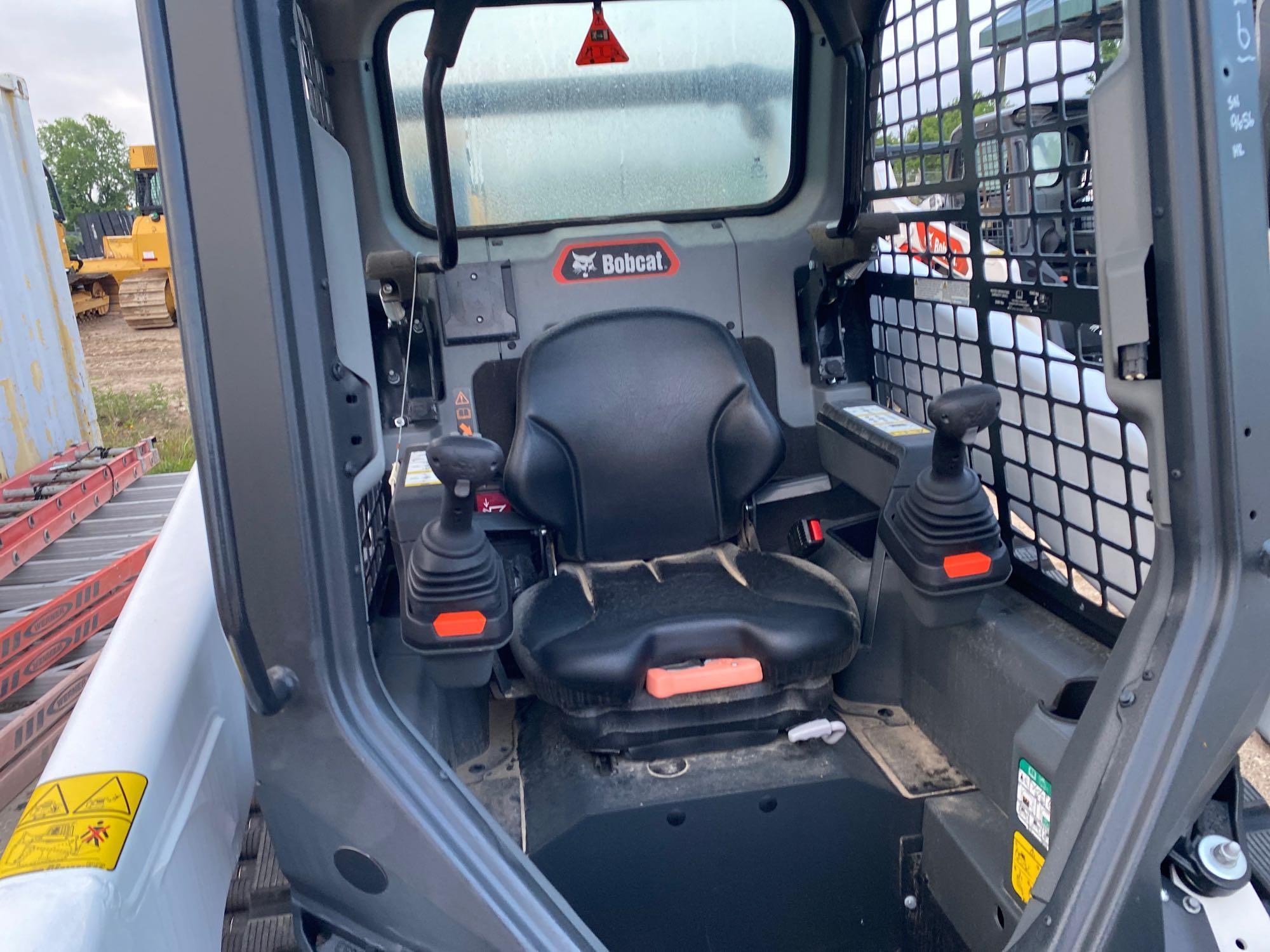 2023 BOBCAT T64 RUBBER TRACKED SKID STEER powered by diesel engine, equipped with rollcage,