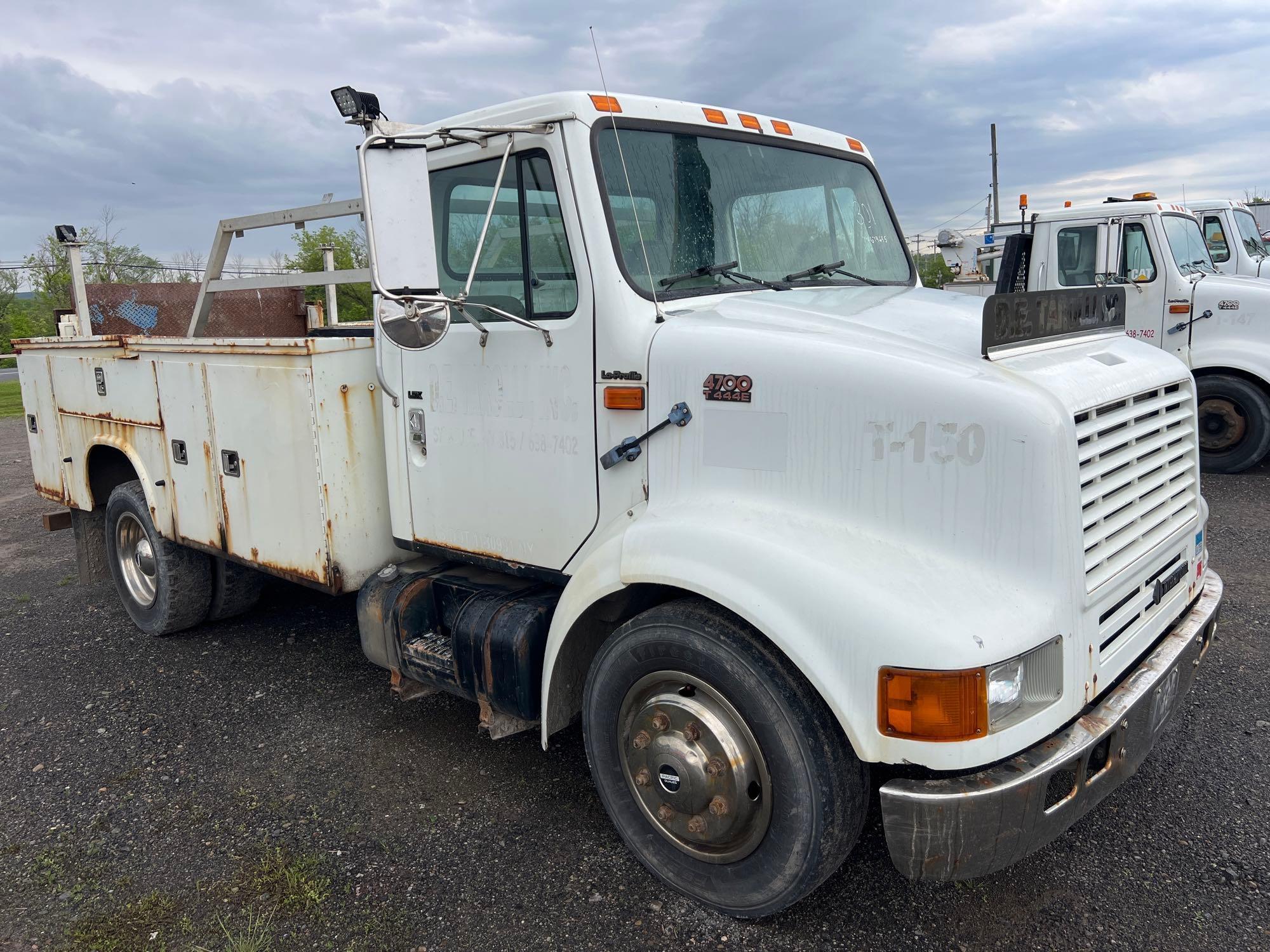 1999 INTERNATIONAL 4700 UTILITY TRUCK VN:1HTSMABM3XH674645 powered by T444E diesel engine, equipped