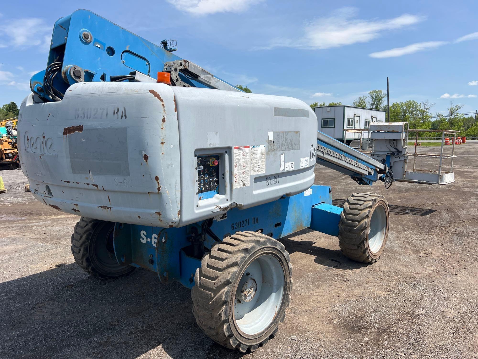 GENIE S60 BOOM LIFT SN:613467 4x4, powered by diesel engine, equipped with 60ft. Platform height,