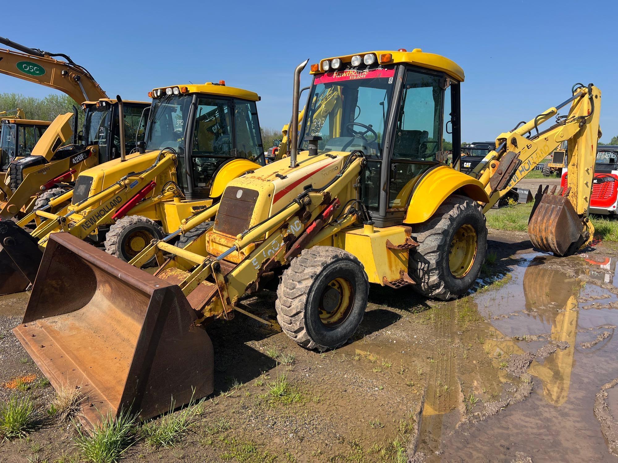 NEW HOLLAND LB75 TRACTOR LOADER BACKHOE SN:031049792 4x4, powered by diesel engine, equipped with