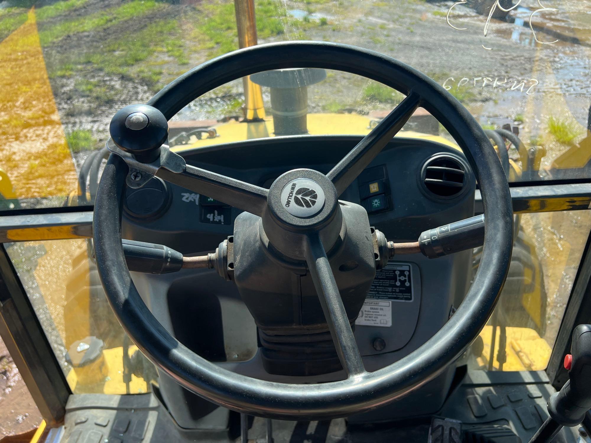 NEW HOLLAND LB75 TRACTOR LOADER BACKHOE SN:031049792 4x4, powered by diesel engine, equipped with