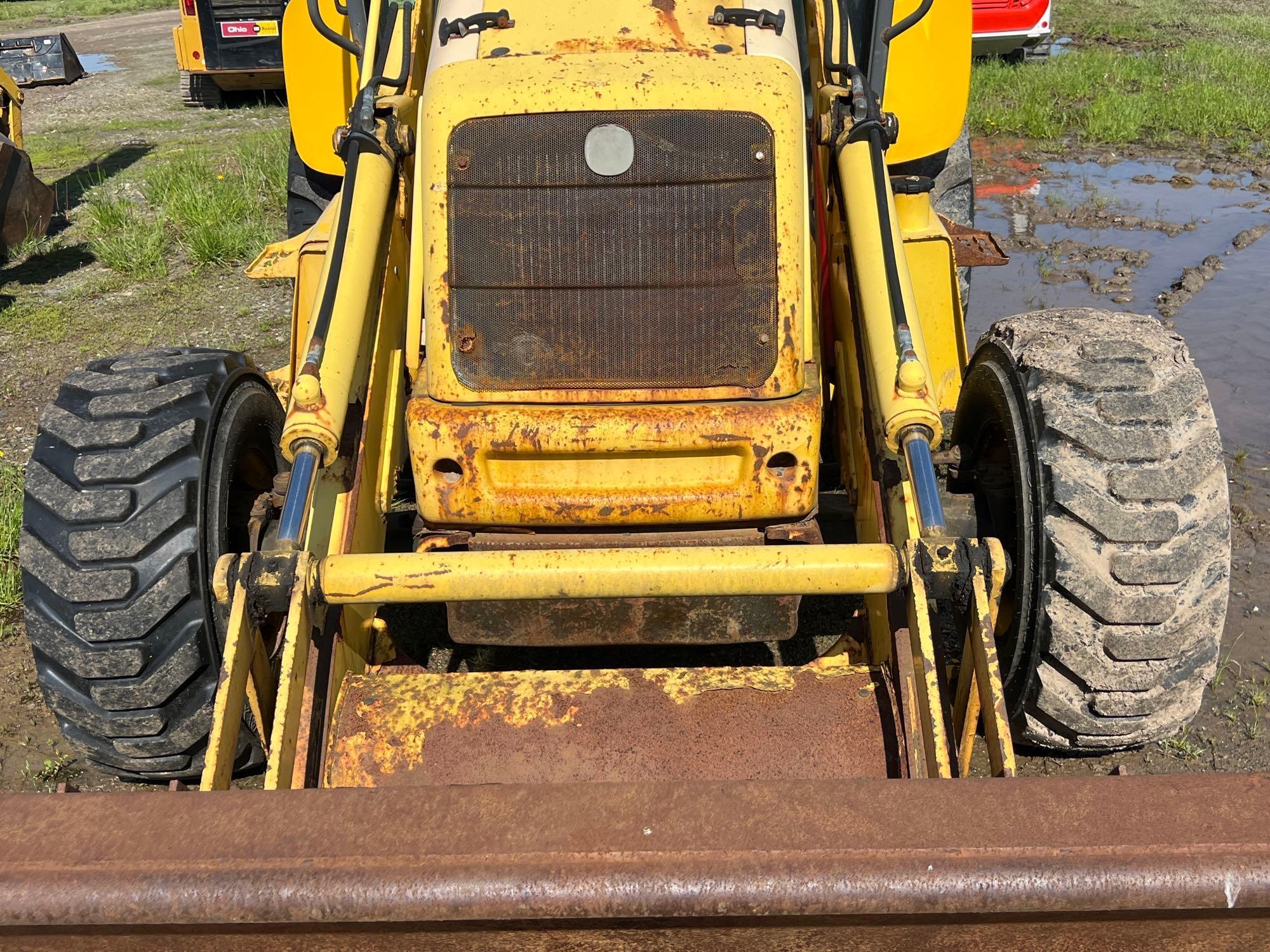 NEW HOLLAND LB75 TRACTOR LOADER BACKHOE SN:031049792 4x4, powered by diesel engine, equipped with