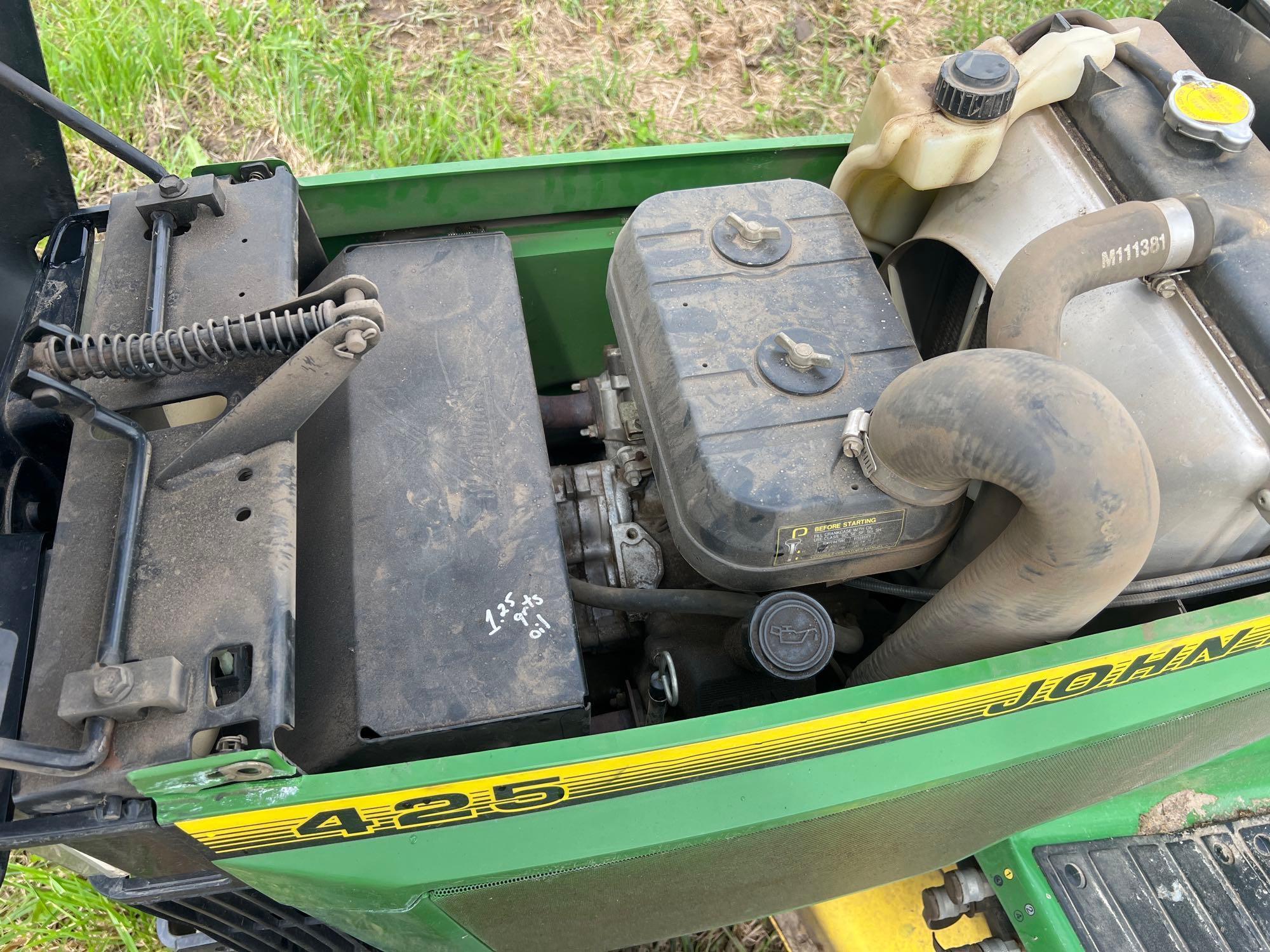 JOHN DEERE 425 LAWN & GARDEN TRACTOR powered by gas engine, equipped with 48in. Cutting deck.