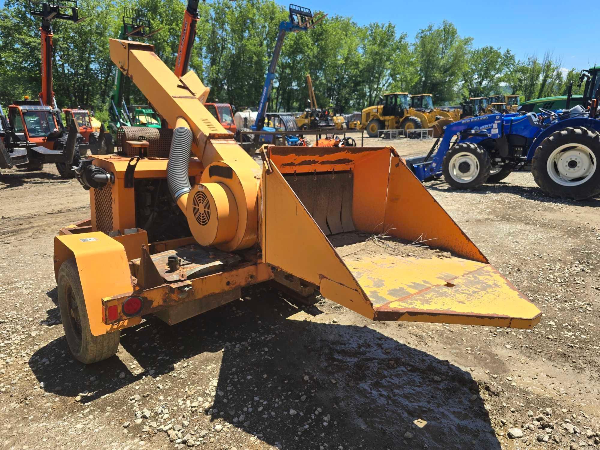 ALTEC WOOD CHIPPER SN: 478723 powered by Kubota diesel engine, equipped with 12in. Chipping