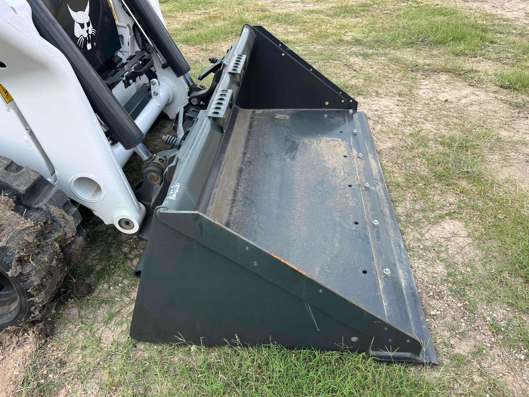 2023 BOBCAT T64 RUBBER TRACKED SKID STEER powered by diesel engine, equipped with rollcage,