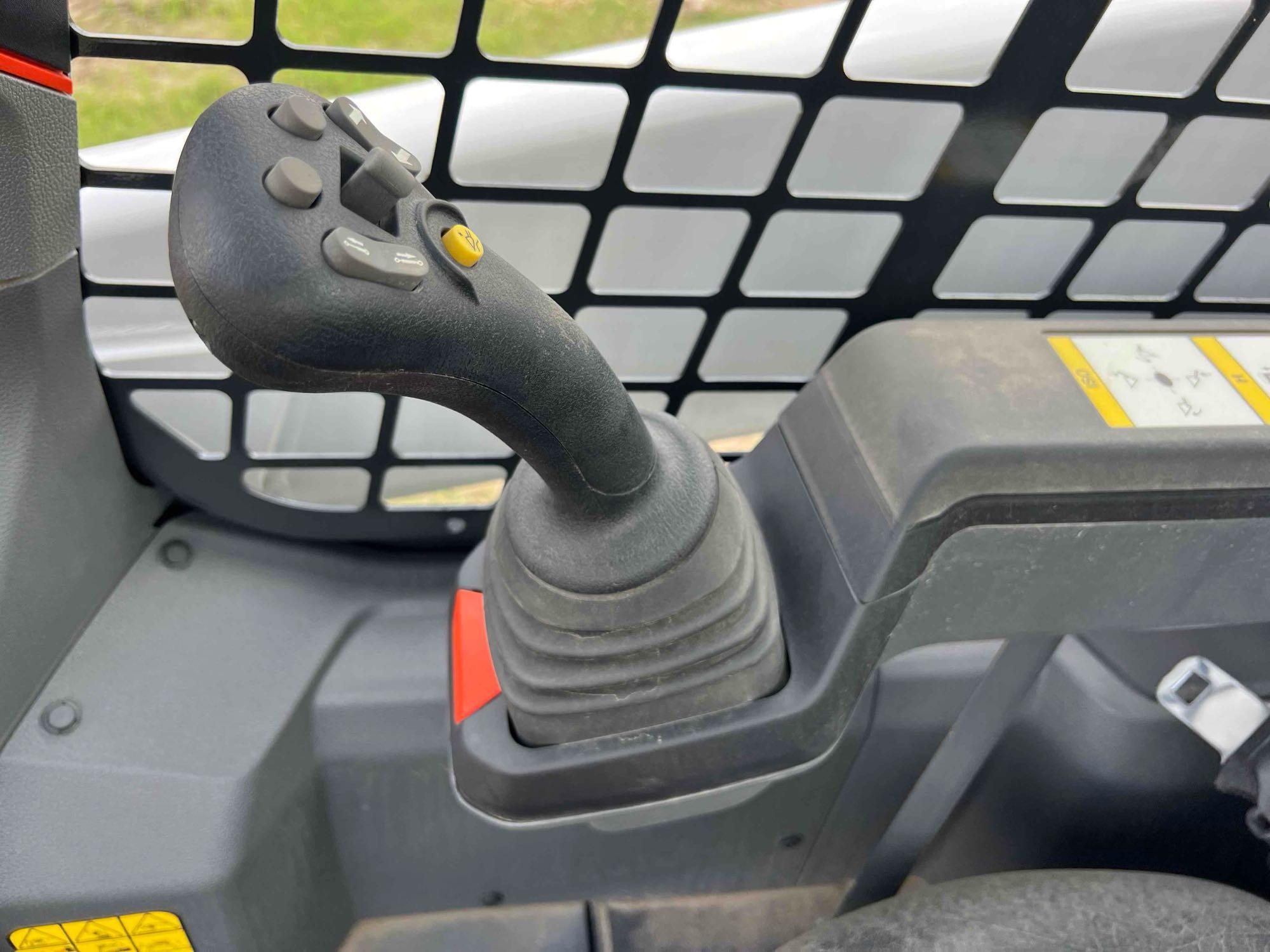 2023 BOBCAT T64 RUBBER TRACKED SKID STEER powered by diesel engine, equipped with rollcage,