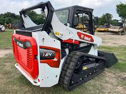 2023 BOBCAT T64 RUBBER TRACKED SKID STEER powered by diesel engine, equipped with rollcage,