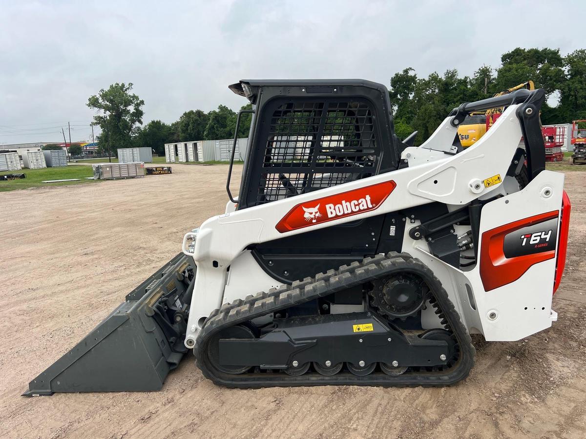 2023 BOBCAT T64 RUBBER TRACKED SKID STEER powered by diesel engine, equipped with rollcage,