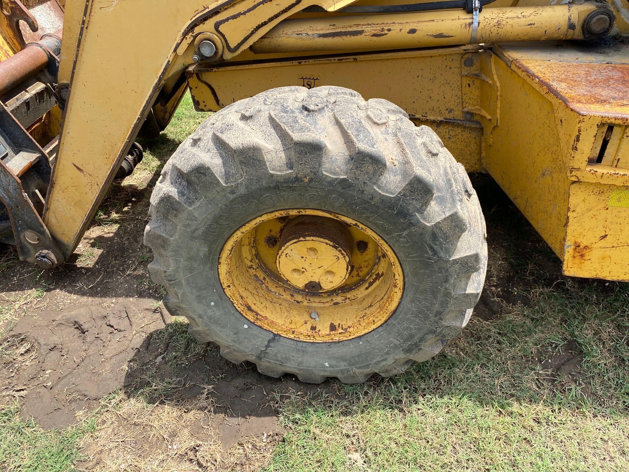 JOHN DEERE 310 SUPER G TRACTOR LOADER BACKHOE SN:951856 4x4, powered by John Deere diesel engine,