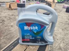 NEW MYSTICK SYNTHETIC 2 CYCLE MOTOR OIL ( 4 GAL PER CASE ) NEW SUPPORT EQUIPMENT