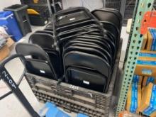 LARGE QTY OF FOLDING CHAIRS ON RACKS SUPPORT EQUIPMENT