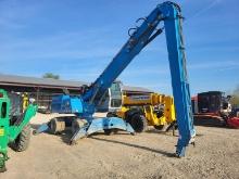 FUCHS MHL335F3 MATERIAL HANDLER SN:MHL335/0228 powered by diesel engine, equipped with hydraulic