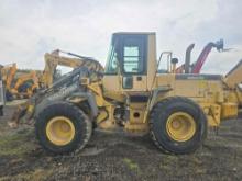 KOMATSU WA250-3L RUBBER TIRED LOADER SN:127 powered by Komatsu diesel engine, equipped with EROPS.