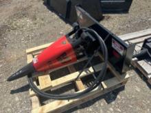 RAMMER IN22 SKID STEER ATTACHMENT equipped with moil point.