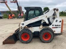 BOBCAT S650 SKID STEER SN:19754 powered by diesel engine, equipped with EROPS, auxiliary hydraulics,