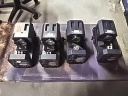 Lot on shelf of 4 American DJ Mighty Scan lights