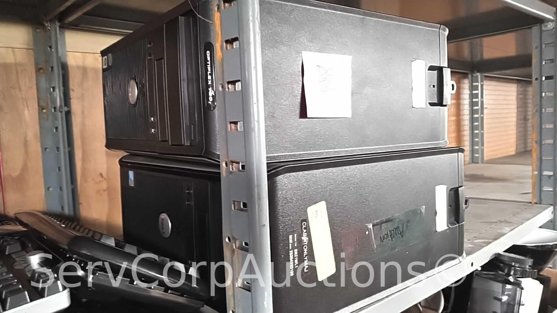 Lot on 9 Shelves of Computer Equipment: Monitors (Dell, Acer, HP, IBM, ViewSonic), Printers (Label