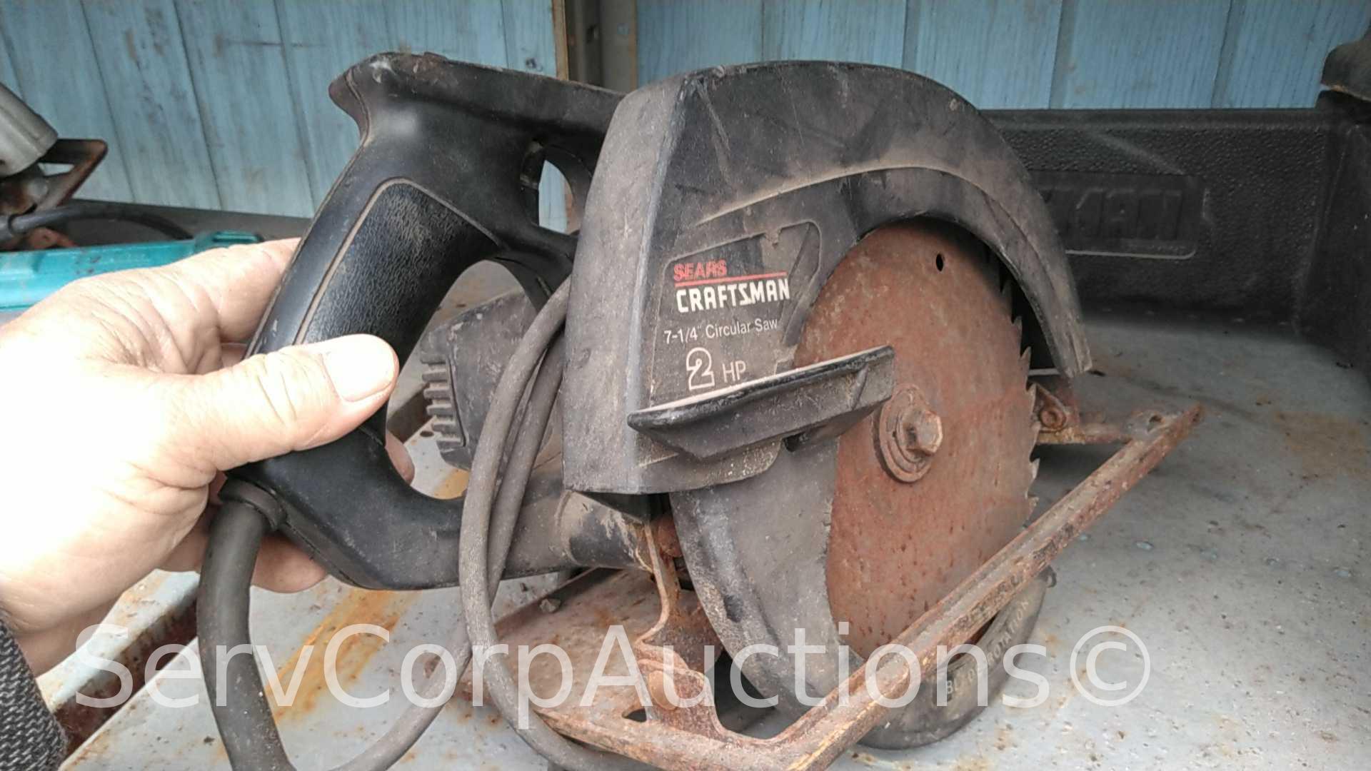 Lot on Shelf of Dewalt Band Saw, Craftsman Circular Saw and Craftsman Chainsaw