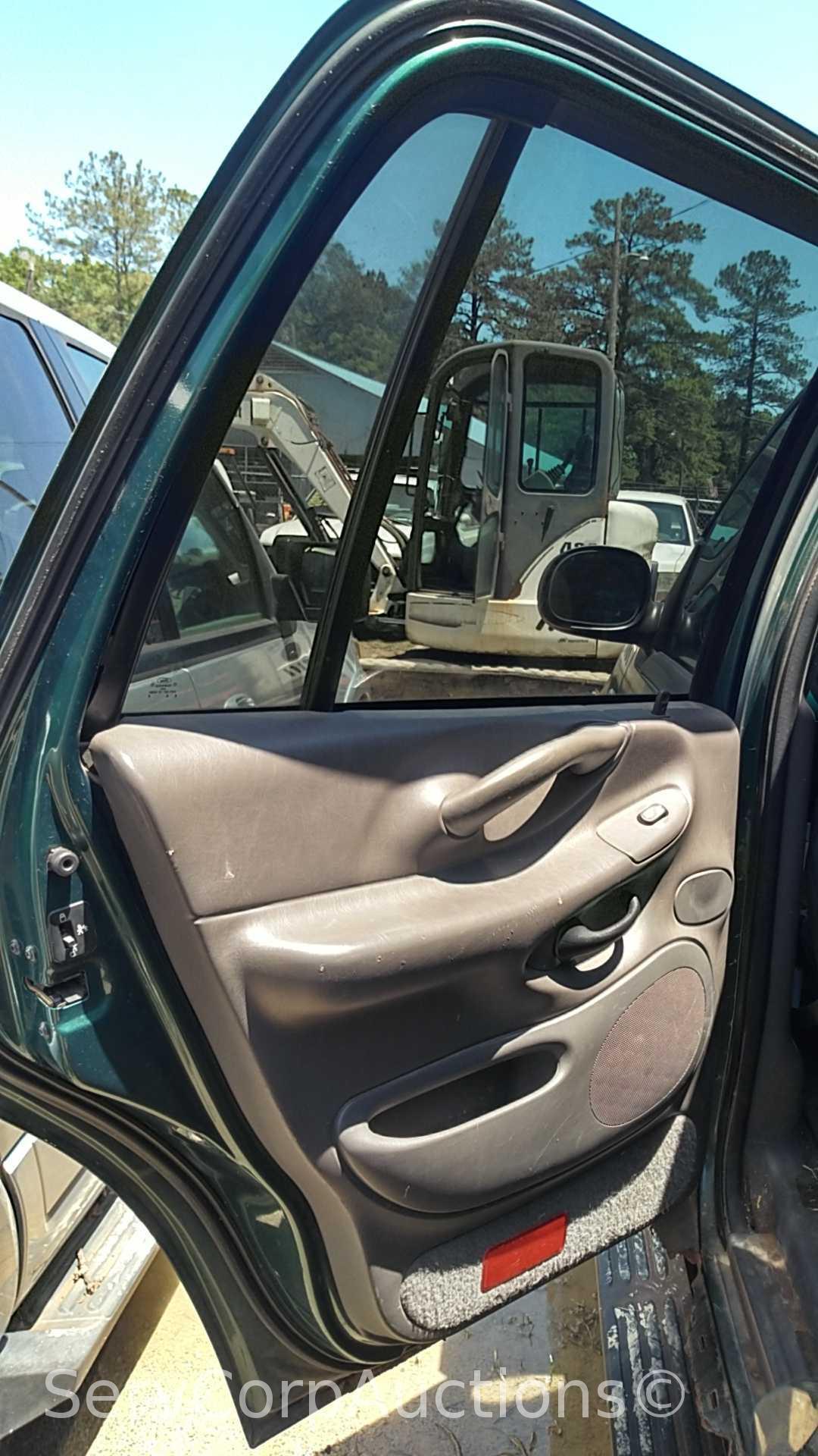 1999 Ford Expedition Multipurpose Vehicle (MPV), VIN # 1FMRU1863XLA85513