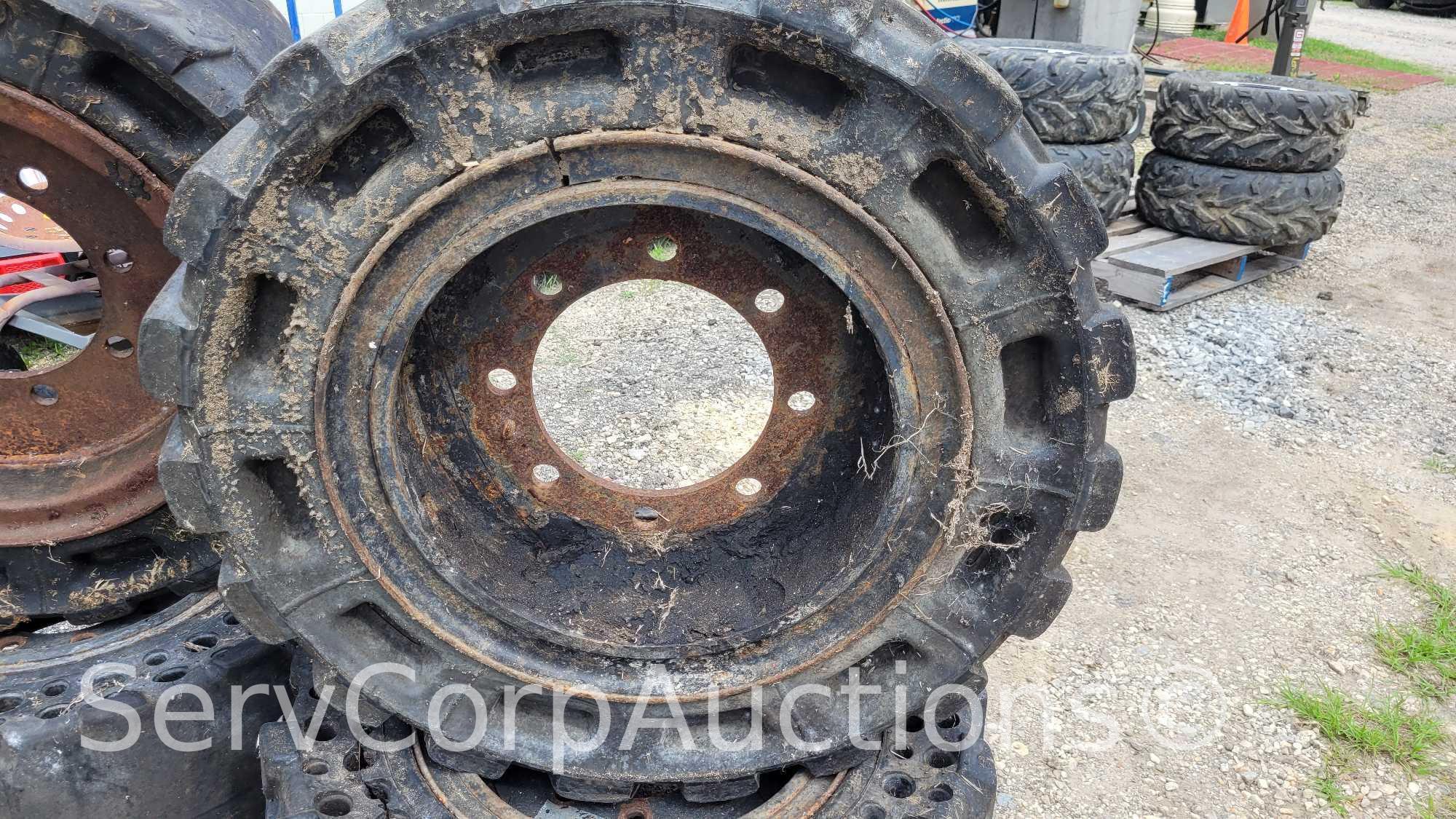 Lot on Pallet of (2) 12.16.5 and (2) 33x12-16 Skid Steer Tires
