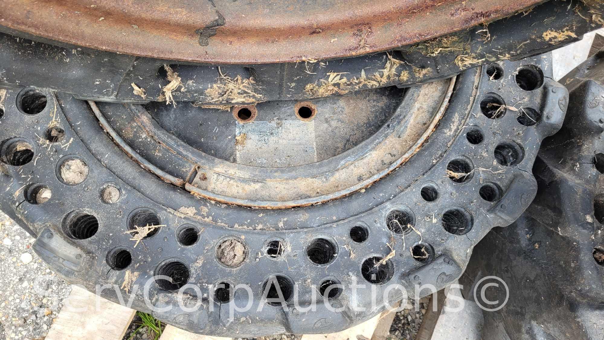 Lot on Pallet of (2) 12.16.5 and (2) 33x12-16 Skid Steer Tires