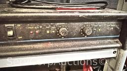 Lot on Shelf of QSC MX 1500A Professional Stereo Amplifier