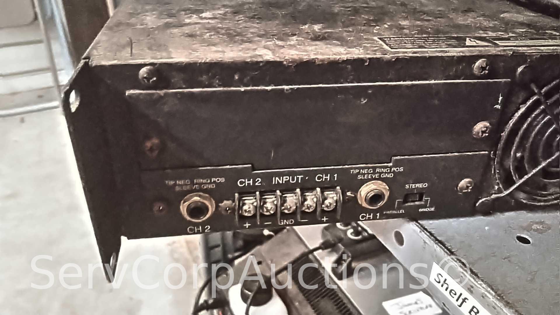 Lot on Shelf of QSC MX 1500A Professional Stereo Amplifier