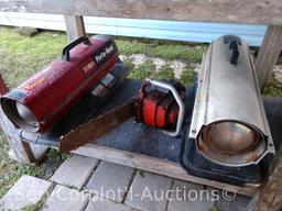 Lot on Shelf of Homelite Chainsaw, Reddy Heater 70,000 BTU Turbo Heater, Toro Porta-Heat 40,000 BUT