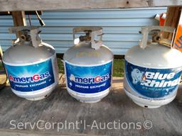 Lot on Shelf of 3 15-lbs Propane Exchange Bottles