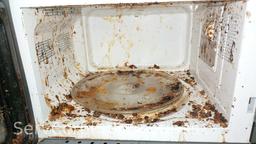Lot on Shelf of Haier Microwave, 3 Various Cooking Pots