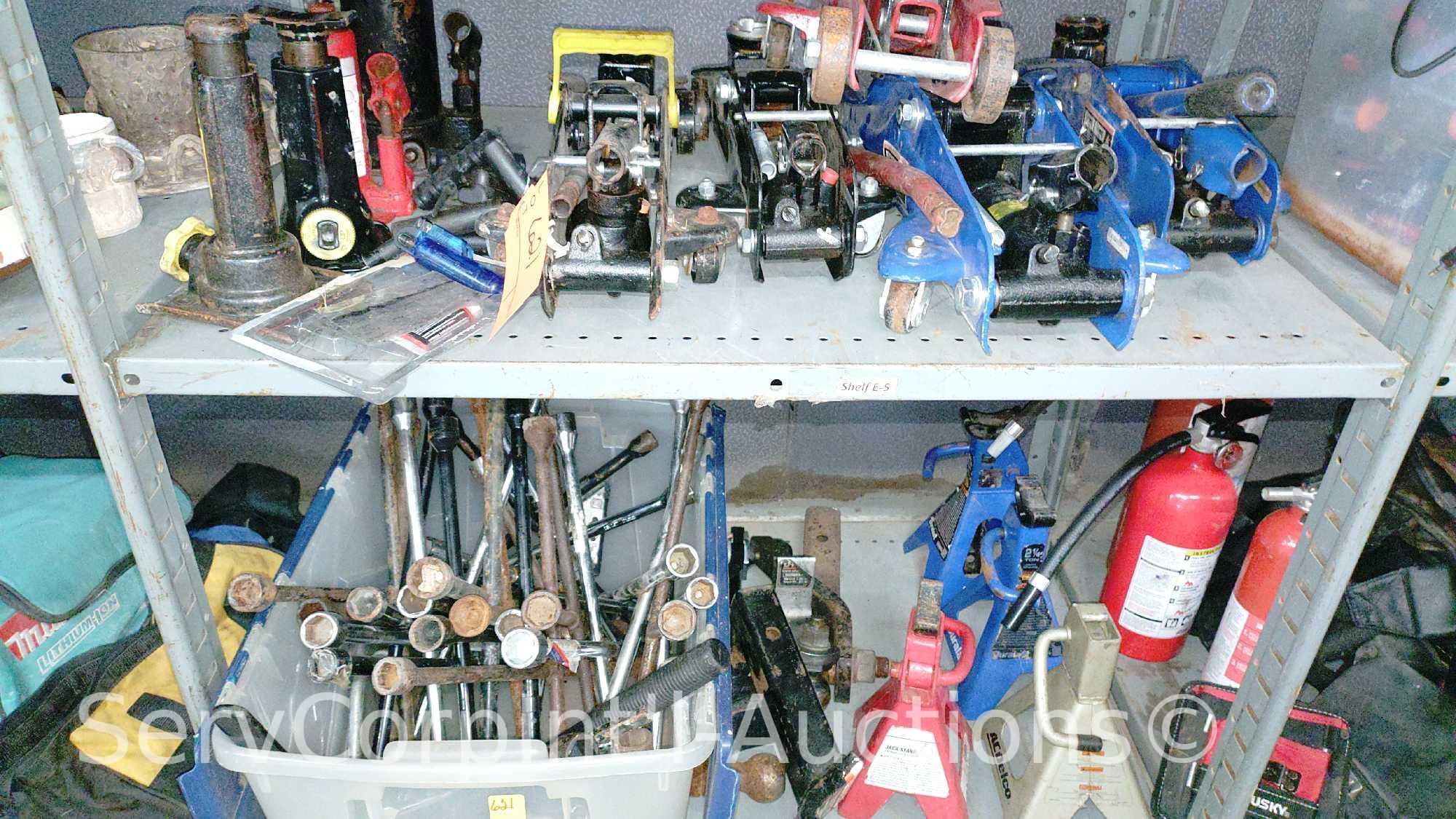 Lot on 2 Shelves of Various Floor Jacks, Bottle Jacks, Ball Mount Hitches, Jack Stands, 4-Ways, Lug