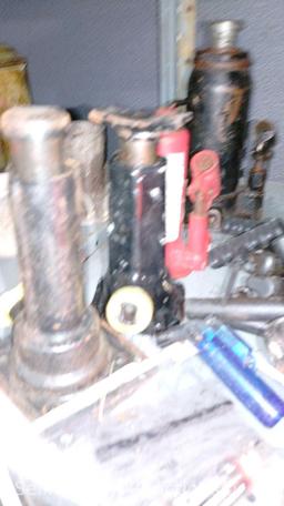 Lot on 2 Shelves of Various Floor Jacks, Bottle Jacks, Ball Mount Hitches, Jack Stands, 4-Ways, Lug