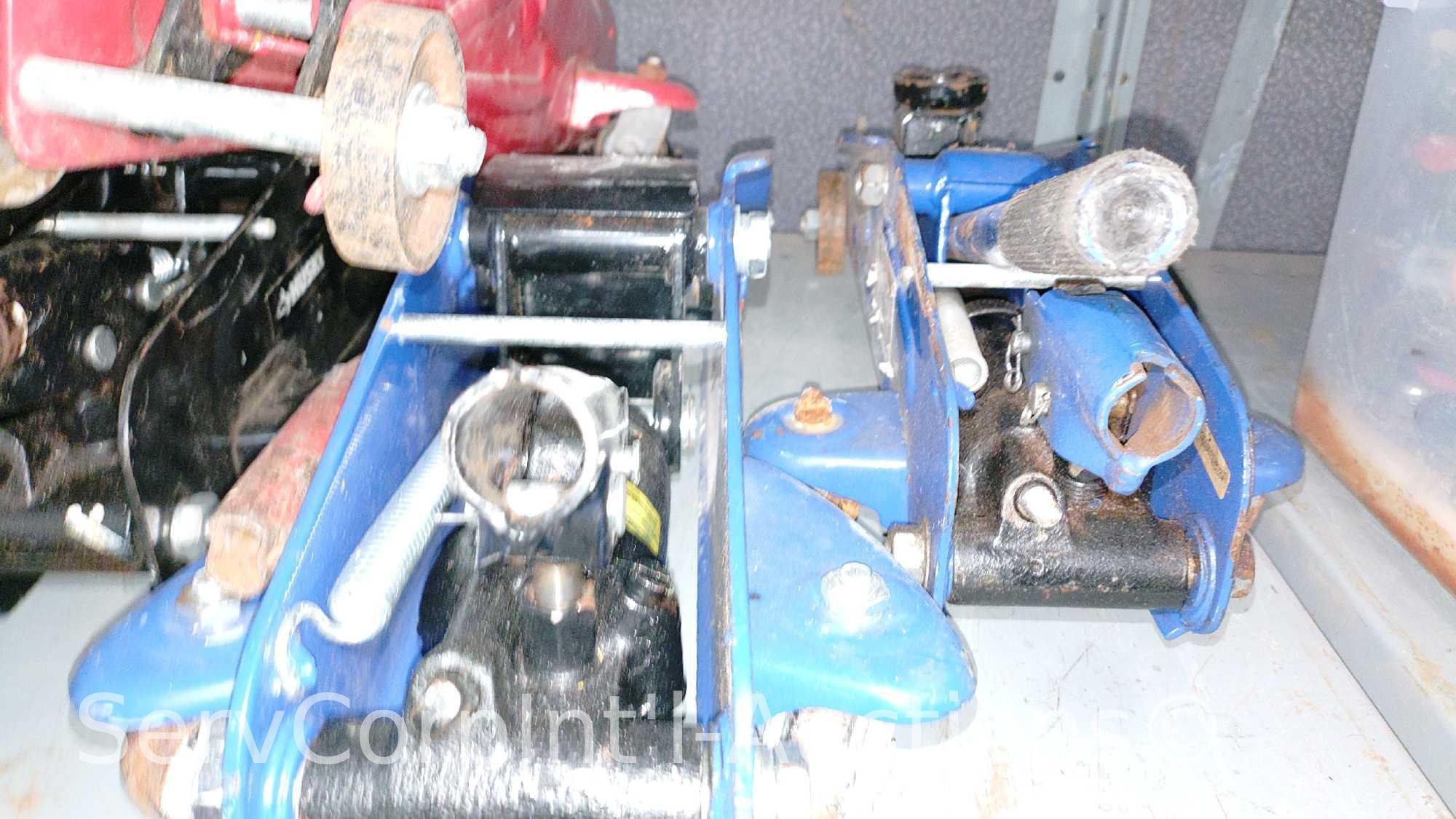 Lot on 2 Shelves of Various Floor Jacks, Bottle Jacks, Ball Mount Hitches, Jack Stands, 4-Ways, Lug
