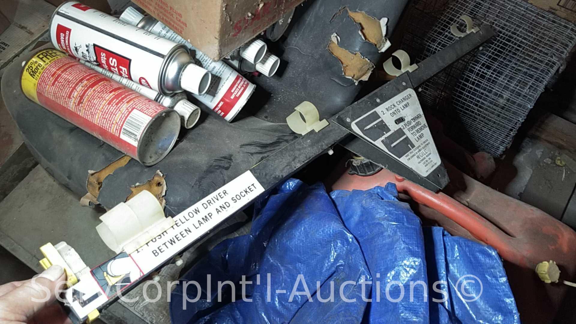Lot on Pallet of Starting Fluid, Mower Seat, Gas Can, Tarp, Bug Zapper, Rock Changer, Homemade Wire