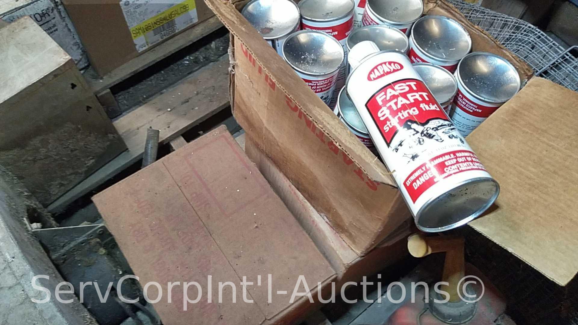 Lot on Pallet of Starting Fluid, Mower Seat, Gas Can, Tarp, Bug Zapper, Rock Changer, Homemade Wire