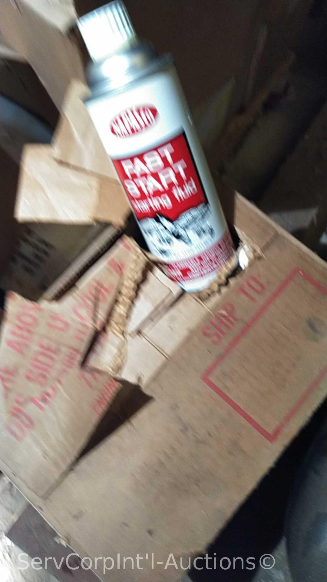 Lot on Pallet of Starting Fluid, Mower Seat, Gas Can, Tarp, Bug Zapper, Rock Changer, Homemade Wire