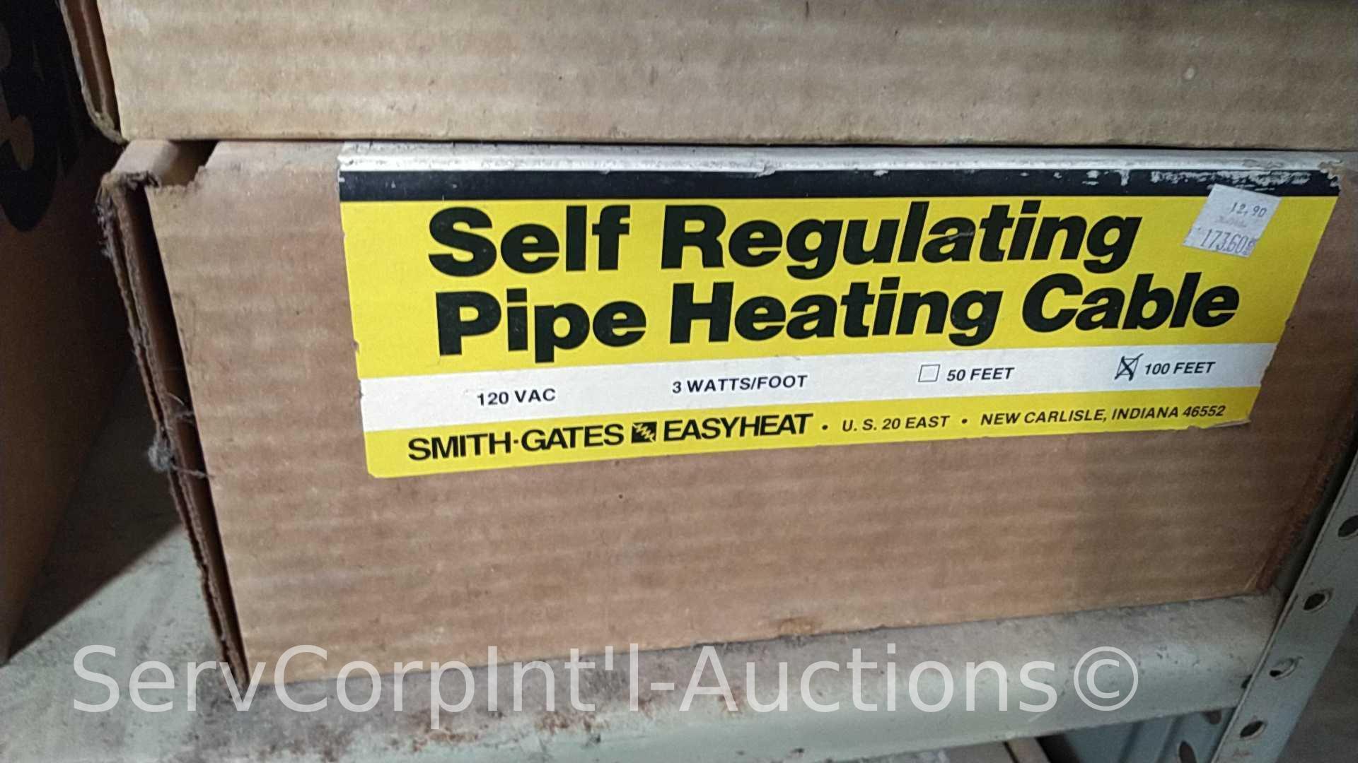 Lot on Shelves of Various Pipe Heating Cables, Ice Cream Makers, Bird Houses, Heating Pads, Dog